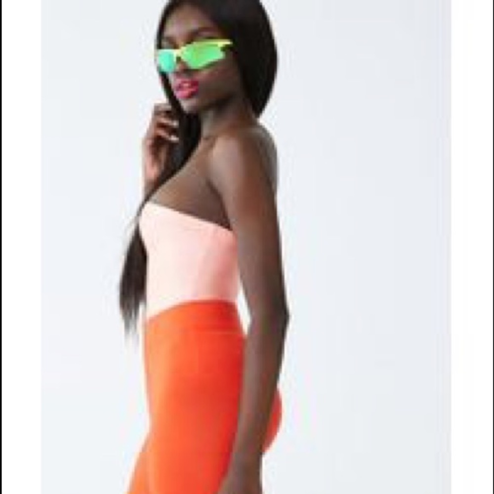 Brand new, never worn bodysuit.